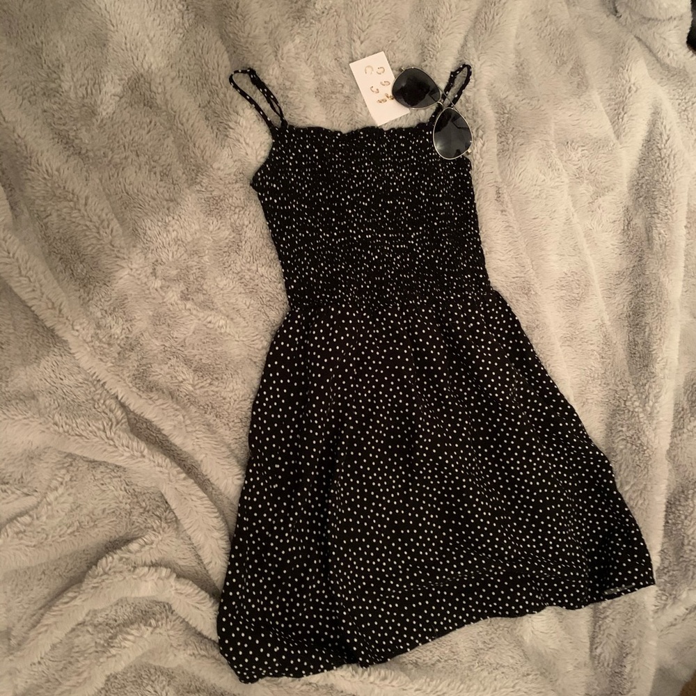 Cute polka dot dress with ruched top